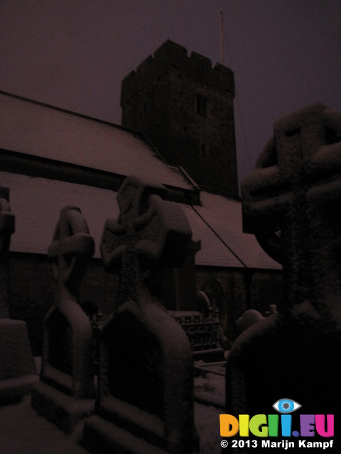 SX25897 Snow on celtic crosses OId St Illtud's Church Llantwit Major